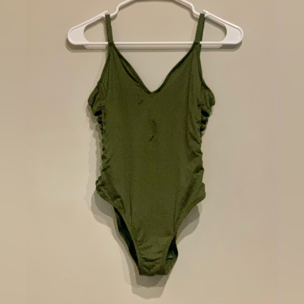 Green one piece bathing suit